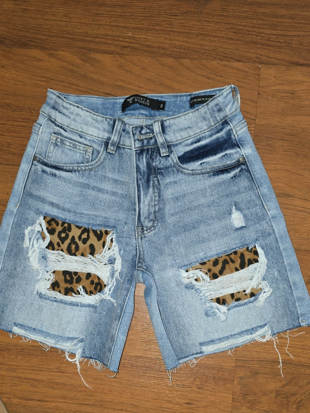 Lucky & Blessed Light Blue Distressed Denim Shorts with Leopard Patches